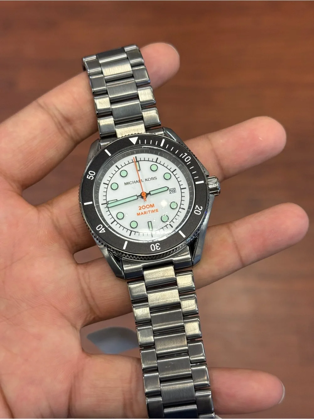 Michael Kors Silver Stainless Steel Watch with Black Bezel and White Dial men’s